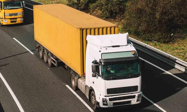 truck driving down highway