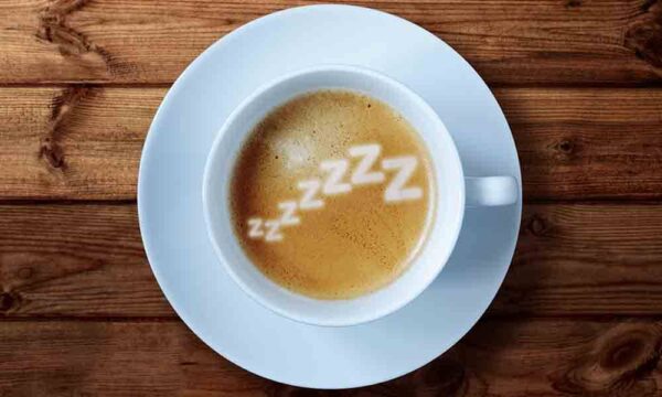 cup of coffee with "zzz" spelt out in cream