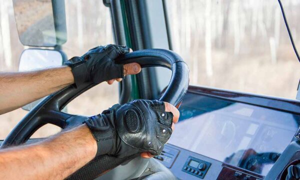 truck driver holding the steering wheel