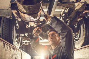 Truck Mechanic Working on Maintance