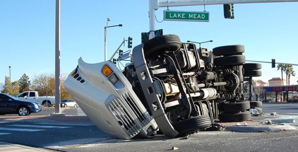 Heavily damaged semi truck in an Atlanta, GA intersection