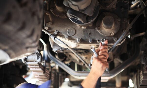 Truck Mechanic Working on Maintance