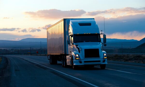 semi truck driving down highway