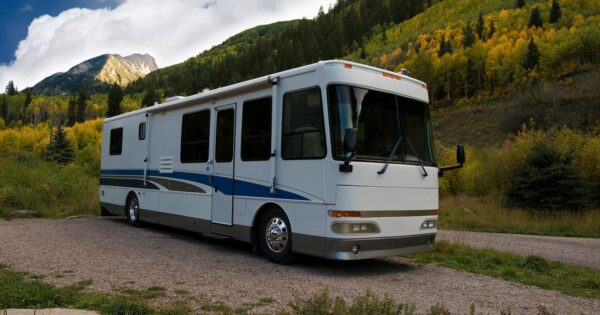 Large recreational vehicle parked in nature scenery