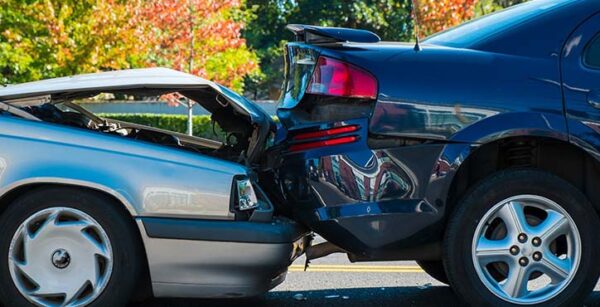 Two damaged cars after a rear-end accident in Atlanta, GA