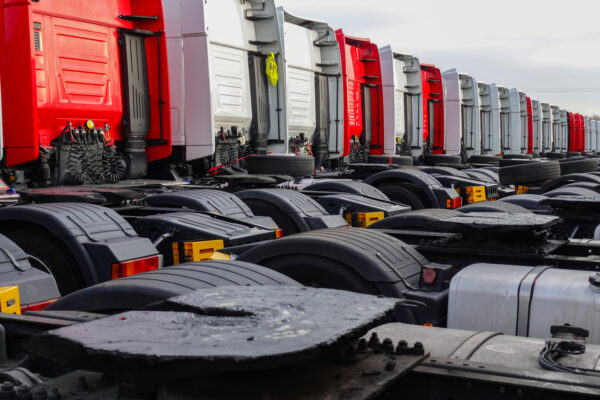 Row of red and white trucks ready for deployment